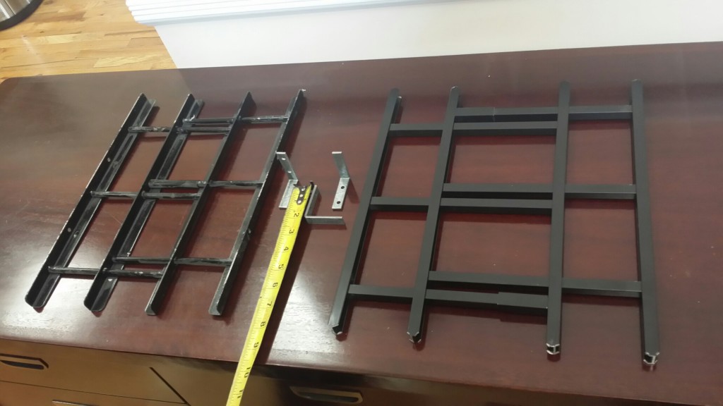 At left: Common steel painted with liquid paint and over time will rust  |  At right: Sentry Window Guard in powder coated aluminum that never rusts and are warrantied or life on the paint finish. Also shown are the L stops that limit the travel height of the lower sash.
